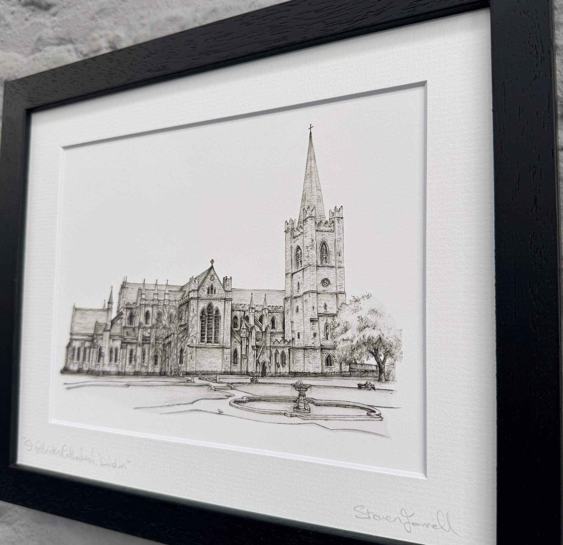 Framed black and white drawing of a cathedral